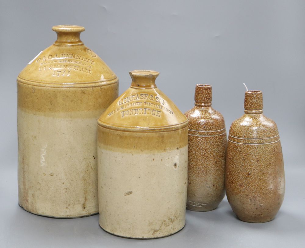 A pair of stoneware vessels, a G. Crease & Son Wine and Spirit Merchants vessel, and a G & C A Bennett ditto